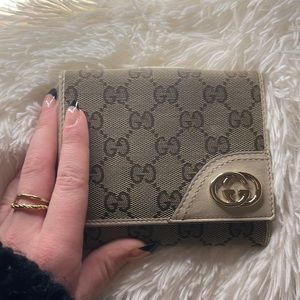 Gucci brown monogram wallet